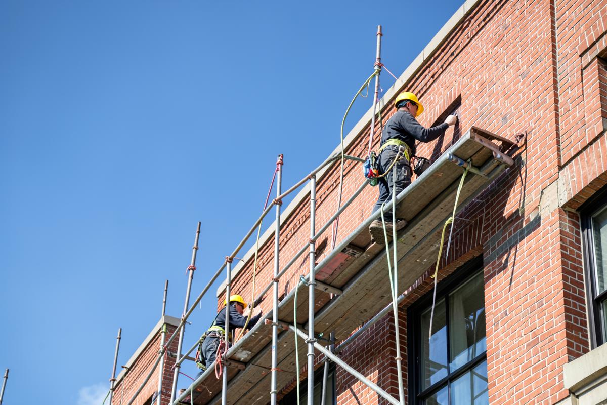 Exterior painting of a municipal brick building